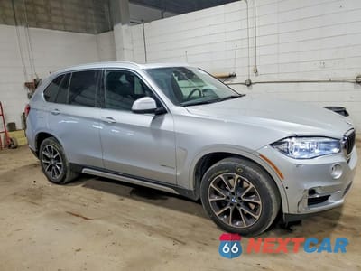 Czwarte zdjęcie samochodu z boku: 2018 BMW X5 XDR40E VIN:5UXKT0C58J0W00367 - miniatura