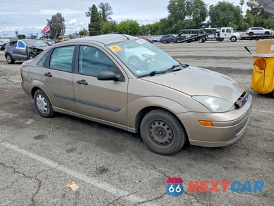 Czwarte zdjęcie samochodu z boku: 2003 FORD FOCUS LX VIN:1FAFP33Z63W329438 - miniatura