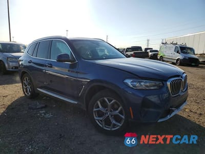 Czwarte zdjęcie samochodu z boku: 2022 BMW X3 XDRIVE30I VIN:5UX53DP09N9K12004 - miniatura