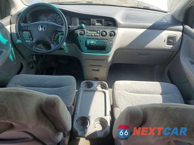 Zdjęcie 8 z 13 samochodu: 2004 HONDA ODYSSEY EX VIN:5FNRL18604B120045 - miniatura