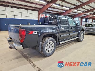Trzecie zdjęcie samochodu z tyłu: 2012 CHEVROLET COLORADO LT VIN:1GCHTDFEXC8114565 - miniatura