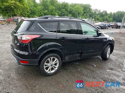 Trzecie zdjęcie samochodu z tyłu: 2018 FORD ESCAPE SE VIN:1FMCU9GD3JUB87299 - miniatura
