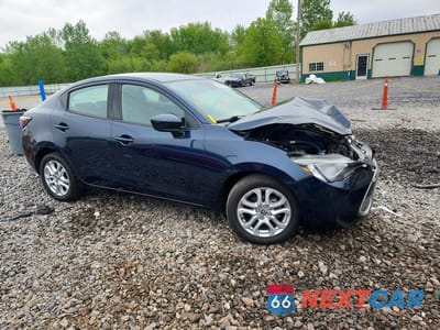 Czwarte zdjęcie samochodu z boku: 2017 TOYOTA YARIS IA BASE VIN:3MYDLBYVXHY163214 - miniatura
