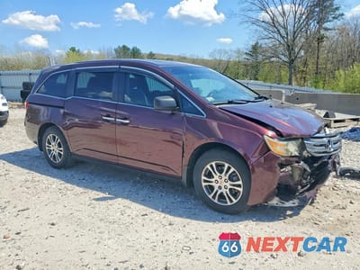 Czwarte zdjęcie samochodu z boku: 2011 HONDA ODYSSEY EXL VIN:5FNRL5H68BB061184 - miniatura