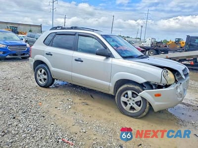 Czwarte zdjęcie samochodu z boku: 2006 HYUNDAI TUCSON GL VIN:KM8JM12B36U458626 - miniatura