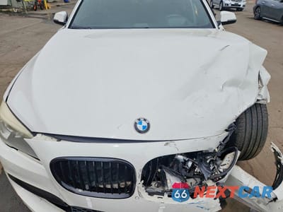Zdjęcie 11 z 13 samochodu: 2014 BMW 750 LXI VIN:WBAYF8C56ED141806 - miniatura