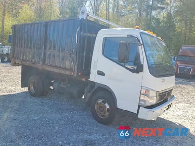Czwarte zdjęcie samochodu z boku: 2007 MITSUBISHI FUSO FE84D DUMP TRUCK VIN:JL6BBG1S17K010120 - miniatura