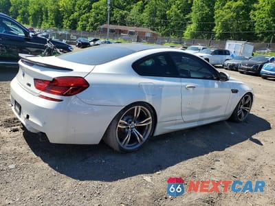 Trzecie zdjęcie samochodu z tyłu: 2013 BMW M6 VIN:WBSLX9C51DC968822 - miniatura