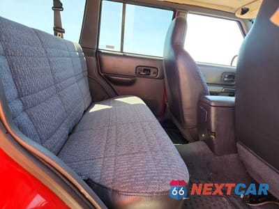 Zdjęcie 11 z 13 samochodu: 2000 JEEP CHEROKEE VIN:1J4FT48S6YL167370 - miniatura