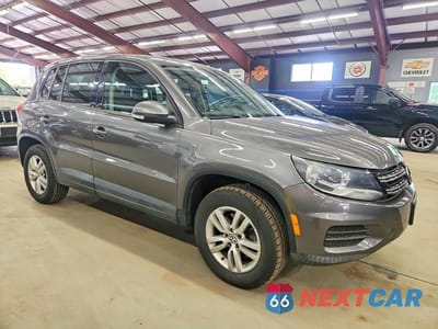 Czwarte zdjęcie samochodu z boku: 2013 VOLKSWAGEN TIGUAN S VIN:WVGAV7AX9DW021096 - miniatura