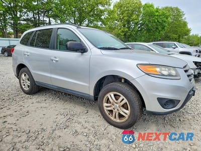 Czwarte zdjęcie samochodu z boku: 2012 HYUNDAI SANTA FE GLS VIN:5XYZGDAB3CG104037 - miniatura
