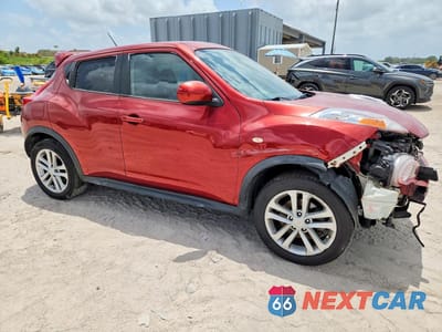 Czwarte zdjęcie samochodu z boku: 2011 NISSAN JUKE S VIN:JN8AF5MV5BT028114 - miniatura