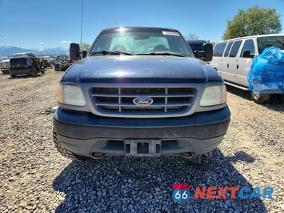 Piąte zdjęcie samochodu w środku: 2001 FORD F150 VIN:1FTZF18271KF02379 - miniatura