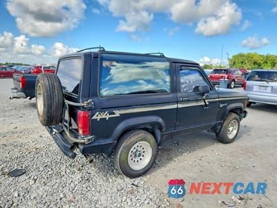 Trzecie zdjęcie samochodu z tyłu: 1988 FORD BRONCO II VIN:1FMCU14T1JUB89081 - miniatura