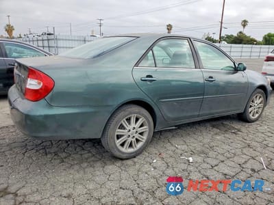 Trzecie zdjęcie samochodu z tyłu: 2002 TOYOTA CAMRY LE VIN:JTDBE32K420117173 - miniatura