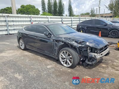 Czwarte zdjęcie samochodu z boku: 2020 AUDI A5 PREMIUM VIN:WAUANCF5XLA004577 - miniatura