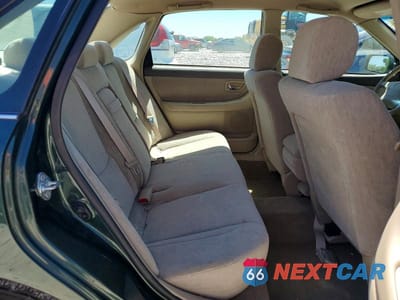 Zdjęcie 10 z 12 samochodu: 2001 TOYOTA AVALON XL VIN:4T1BF28B61U180969 - miniatura