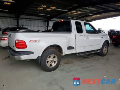 Trzecie zdjęcie samochodu z tyłu: 2002 FORD F150 VIN:2FTRX08L32CA61890 - miniatura
