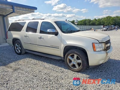 Czwarte zdjęcie samochodu z boku: 2011 CHEVROLET SUBURBAN C1500 LTZ VIN:1GNSCKE06BR357046 - miniatura