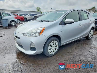 2014 TOYOTA PRIUS C ONE JTDKDTB32E1075385 - główne zdjęcie licytacji z USA - miniatura