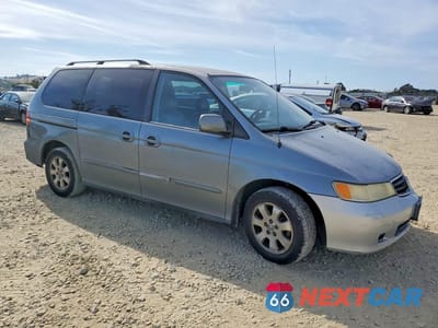 Czwarte zdjęcie samochodu z boku: 2002 HONDA ODYSSEY EX VIN:2HKRL186X2H511962 - miniatura
