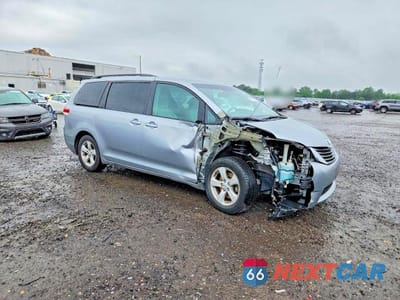 Czwarte zdjęcie samochodu z boku: 2011 TOYOTA SIENNA LE VIN:5TDKK3DC9BS046614 - miniatura