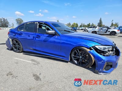 Czwarte zdjęcie samochodu z boku: 2020 BMW M340I VIN:WBA5U7C04LFH05366 - miniatura