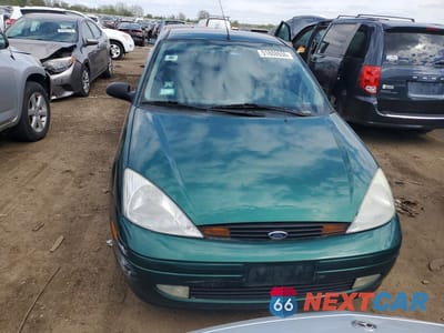 Piąte zdjęcie samochodu w środku: 2000 FORD FOCUS ZX3 VIN:3FAFP313XYR239055 - miniatura