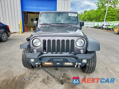 Piąte zdjęcie samochodu w środku: 2017 JEEP WRANGLER UNLIMITED SPORT VIN:1C4HJWDG3HL739416 - miniatura
