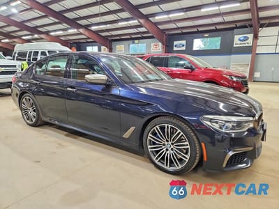 Czwarte zdjęcie samochodu z boku: 2018 BMW M550I VIN:WBAJB9C52JB035796 - miniatura