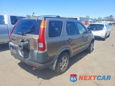 Trzecie zdjęcie samochodu z tyłu: 2004 HONDA CR-V EX VIN:JHLRD77824C018944 - miniatura