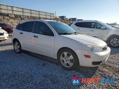 Czwarte zdjęcie samochodu z boku: 2007 FORD FOCUS ZX5 VIN:1FAFP37N07W313796 - miniatura