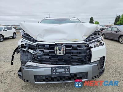 Piąte zdjęcie samochodu w środku: 2026 HONDA PILOT TOURING VIN:5FNYG1H73TB016799 - miniatura