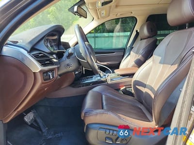 Zdjęcie 7 z 14 samochodu: 2014 BMW X5 XDRIVE50I VIN:5UXKR6C5XE0C02801 - miniatura