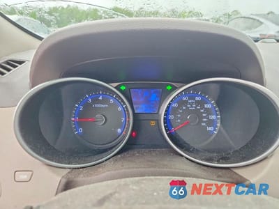 Zdjęcie 9 z 13 samochodu: 2013 HYUNDAI TUCSON GLS VIN:KM8JUCAC3DU680067 - miniatura