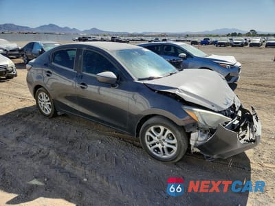 Czwarte zdjęcie samochodu z boku: 2016 SCION IA BASE VIN:3MYDLBZV7GY114047 - miniatura