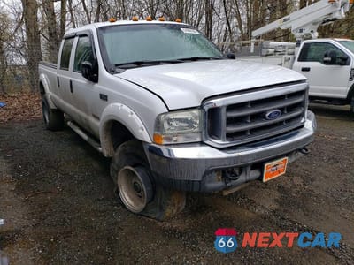Czwarte zdjęcie samochodu z boku: 2004 FORD F350 SRW SUPER DUTY VIN:1FTSW31P64EA47403 - miniatura