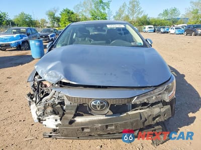 Piąte zdjęcie samochodu w środku: 2022 TOYOTA COROLLA LE VIN:JTDEPMAE3NJ229924 - miniatura