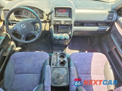 Zdjęcie 8 z 12 samochodu: 2003 HONDA CR-V LX VIN:JHLRD78463C046014 - miniatura