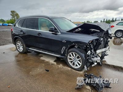 Czwarte zdjęcie samochodu z boku: 2022 BMW X5 XDRIVE45E VIN:5UXTA6C00N9M91485 - miniatura