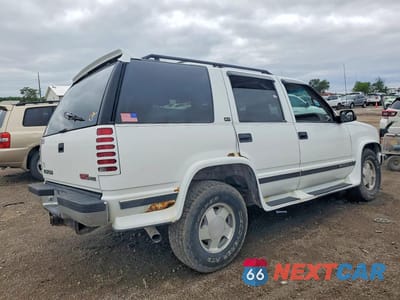 Trzecie zdjęcie samochodu z tyłu: 1997 GMC YUKON VIN:1GKEK13RXVJ712215 - miniatura
