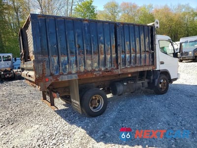 Trzecie zdjęcie samochodu z tyłu: 2007 MITSUBISHI FUSO FE84D DUMP TRUCK VIN:JL6BBG1S17K010120 - miniatura