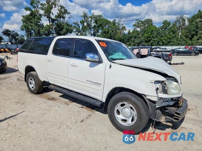 Czwarte zdjęcie samochodu z boku: 2004 TOYOTA TUNDRA DOUBLE CAB SR5 VIN:5TBET34124S458975 - miniatura