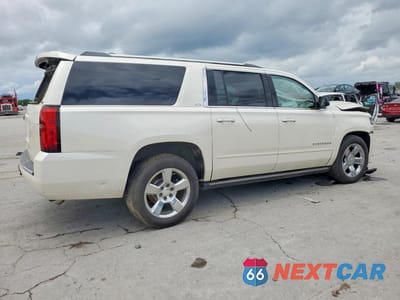 Trzecie zdjęcie samochodu z tyłu: 2015 CHEVROLET SUBURBAN K1500 LTZ VIN:1GNSKKKC1FR156825 - miniatura