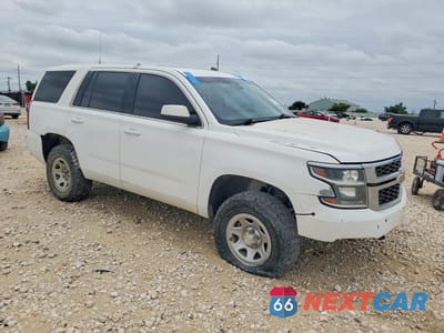 Czwarte zdjęcie samochodu z boku: 2019 CHEVROLET TAHOE SPECIAL VIN:1GNSKFEC5KR125378 - miniatura