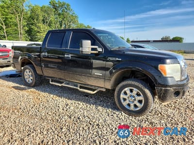 Czwarte zdjęcie samochodu z boku: 2014 FORD F150 SUPERCREW VIN:1FTFW1ET0EKE96088 - miniatura