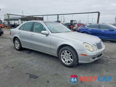 Czwarte zdjęcie samochodu z boku: 2003 MERCEDES-BENZ E 320 VIN:WDBUF65J73A186217 - miniatura