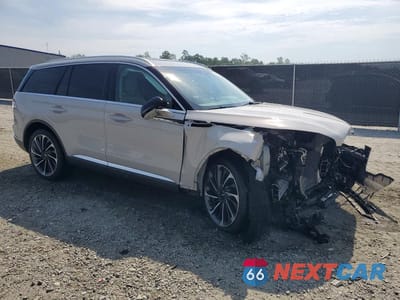 Czwarte zdjęcie samochodu z boku: 2020 LINCOLN AVIATOR RESERVE VIN:5LM5J7XC8LGL03205 - miniatura
