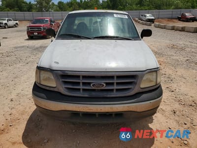 Piąte zdjęcie samochodu w środku: 2000 FORD F150 VIN:1FTZF1723YNB76381 - miniatura
