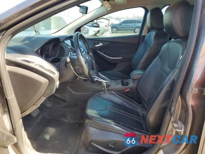 Zdjęcie 7 z 13 samochodu: 2014 FORD FOCUS TITANIUM VIN:1FADP3N21EL311957 - miniatura